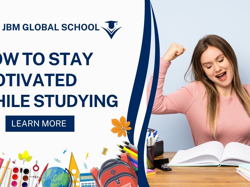 Student studying at a desk feeling motivated and energized, representing tips on how to stay motivated while studying.